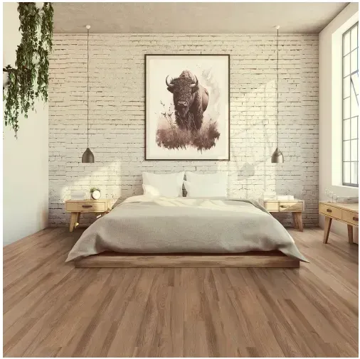 Bedroom with wooden floors, bed, two nightstands, brick wall, artwork of bison, hanging plants.
