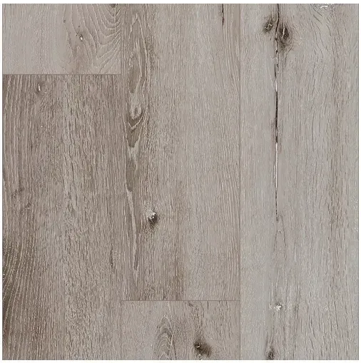 Close-up of weathered gray wood flooring, showing grain and knots.