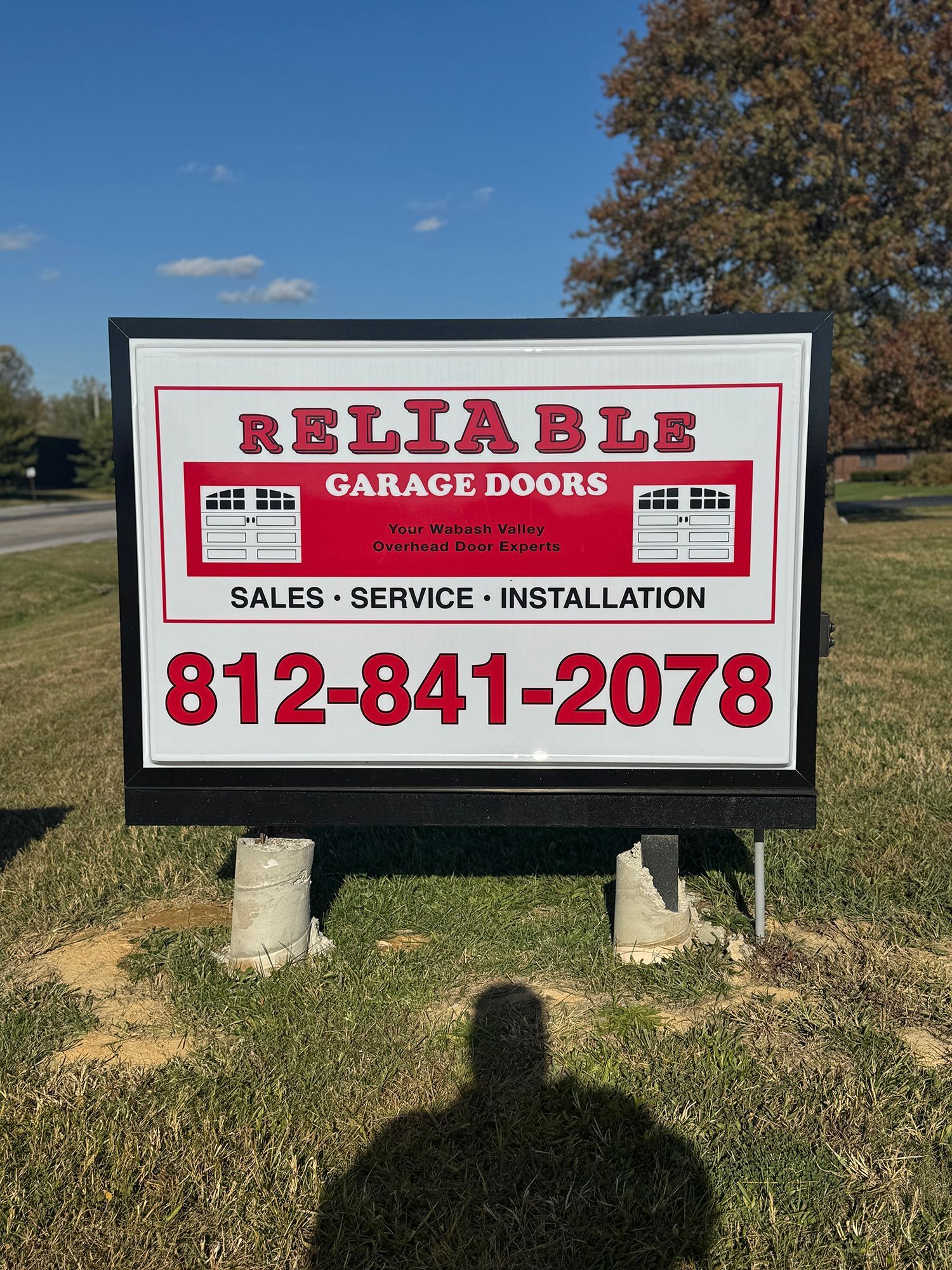 Reliable Carco Dogs sign with sales, service, installation, and phone number 812-841-2078