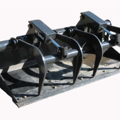Black Bobcat grapple attachment for a skid steer loader.