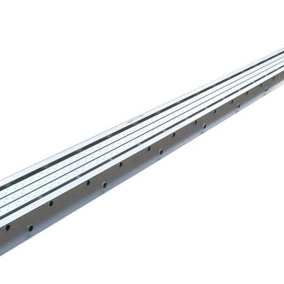Long, silver metal linear guide rail with parallel grooves and evenly spaced holes.