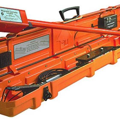 Orange case containing a magnetic and cable locator, with handle and attached components.