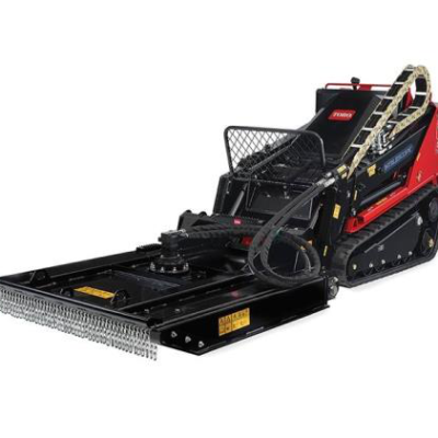 Red and black Toro compact track loader with brush cutter attachment.