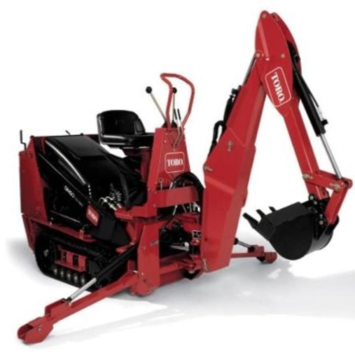 Red and black Toro mini backhoe on a white surface.