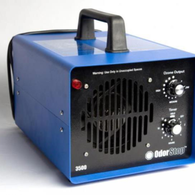 Blue and black OdorStop 3500 ozone generator with a handle and control knobs.