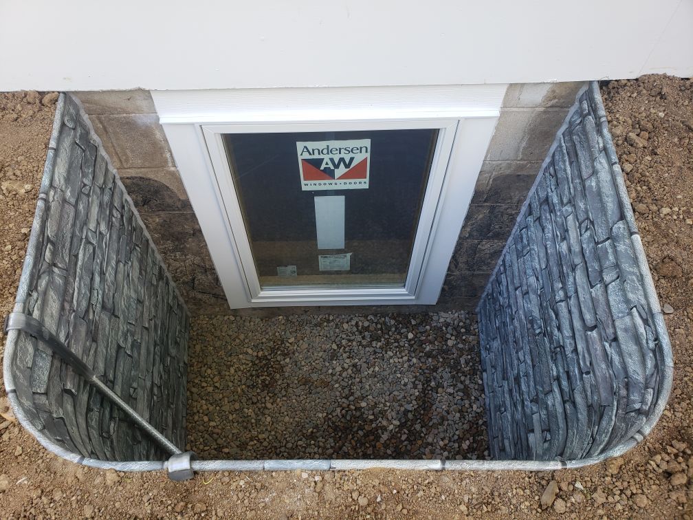 Galvanized Steel Window Wells - stonewall finish