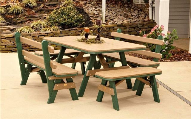 Picnic table set: Green and tan, rectangular table, two benches, two chairs, outdoor patio.