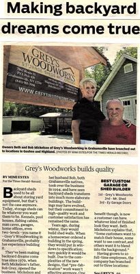 Article about Grey's Woodworks. Two people stand outside a building, smiling. Text and logo are visible.