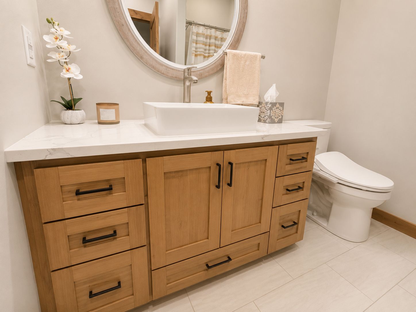 Wooden bathroom vanity with white countertop