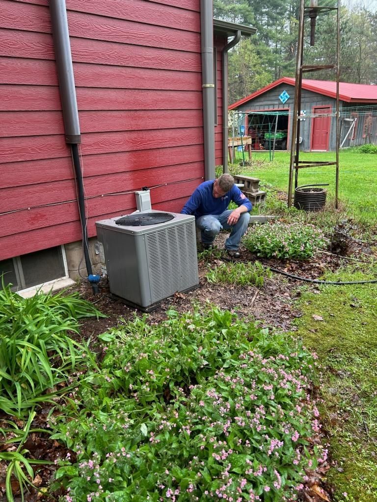 Man inspecting an AC unit