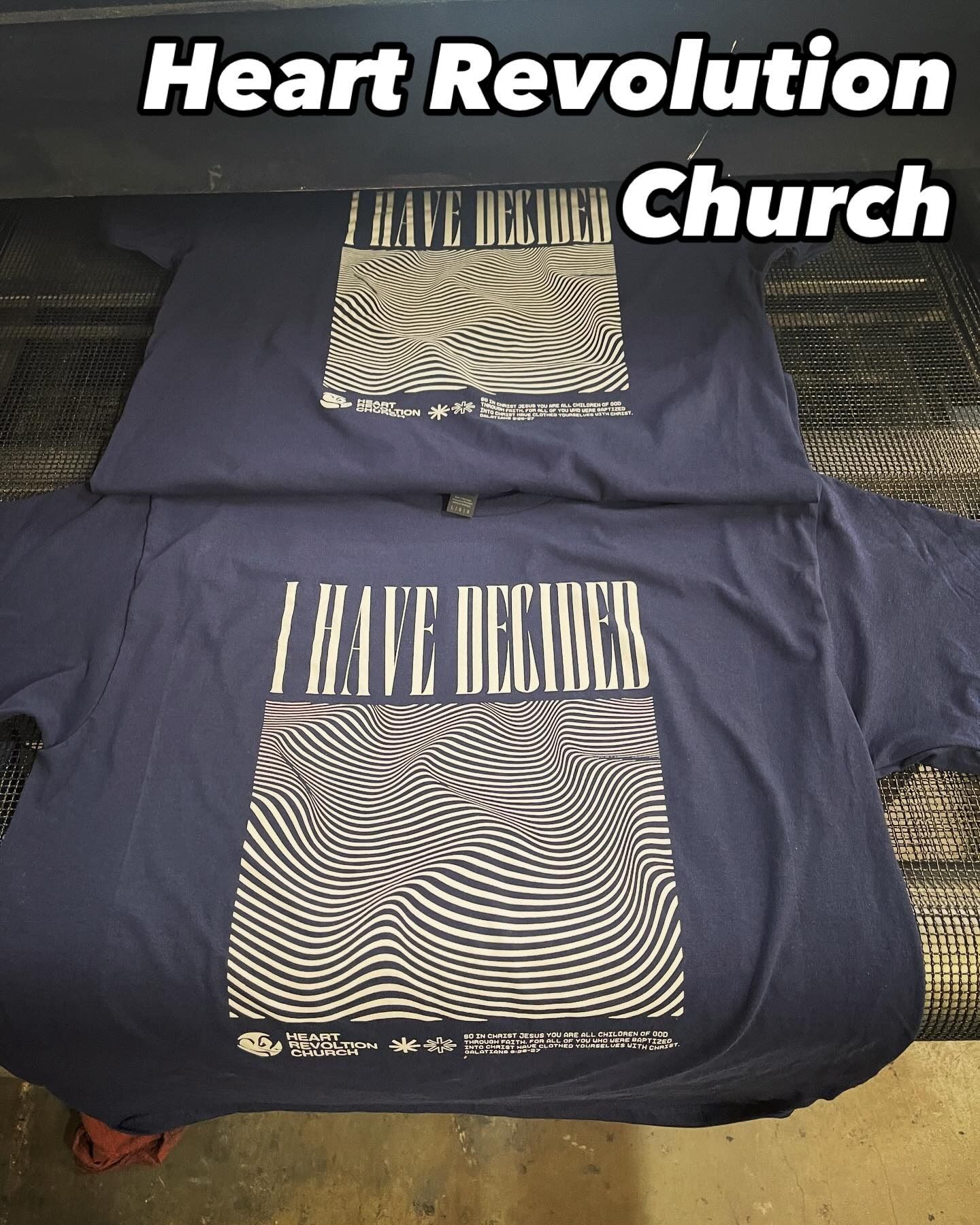 Two navy blue t-shirts with 