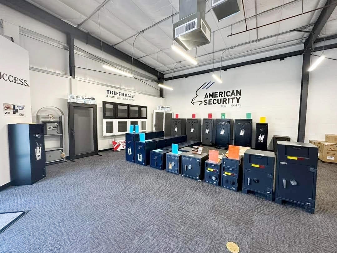 A large room filled with lots of safes and boxes.