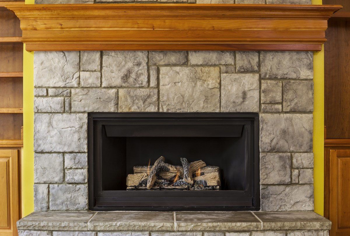 Kozy Heat Nordik gas fireplace with fall decor in a living room in Roanoke, VA.