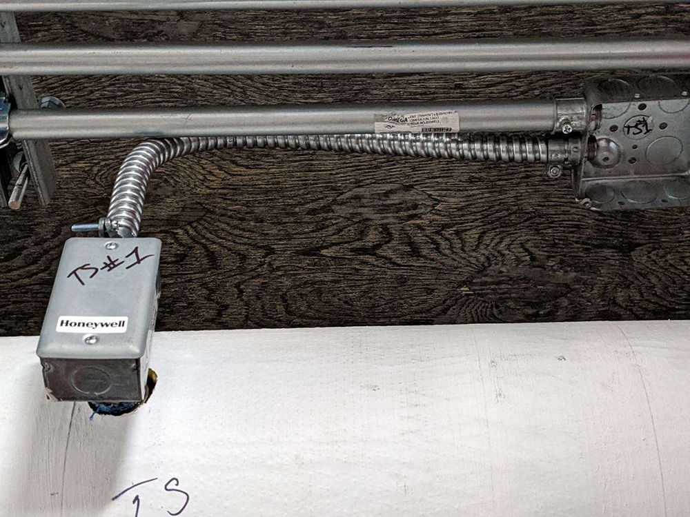 an electrical box on a wall.