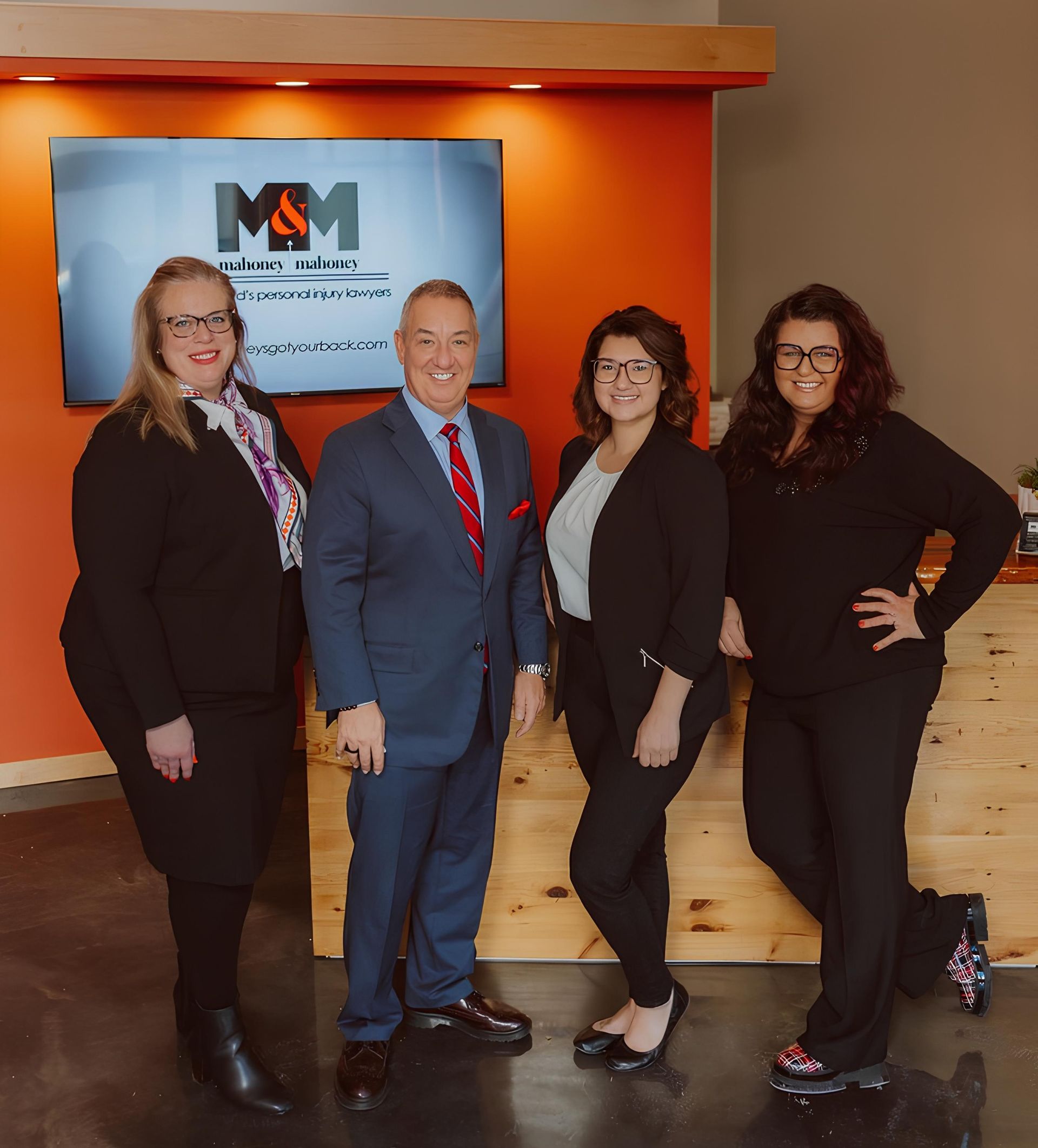 A group of people are posing for a picture