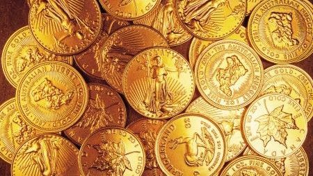 A pile of gold coins with the word liberty on them