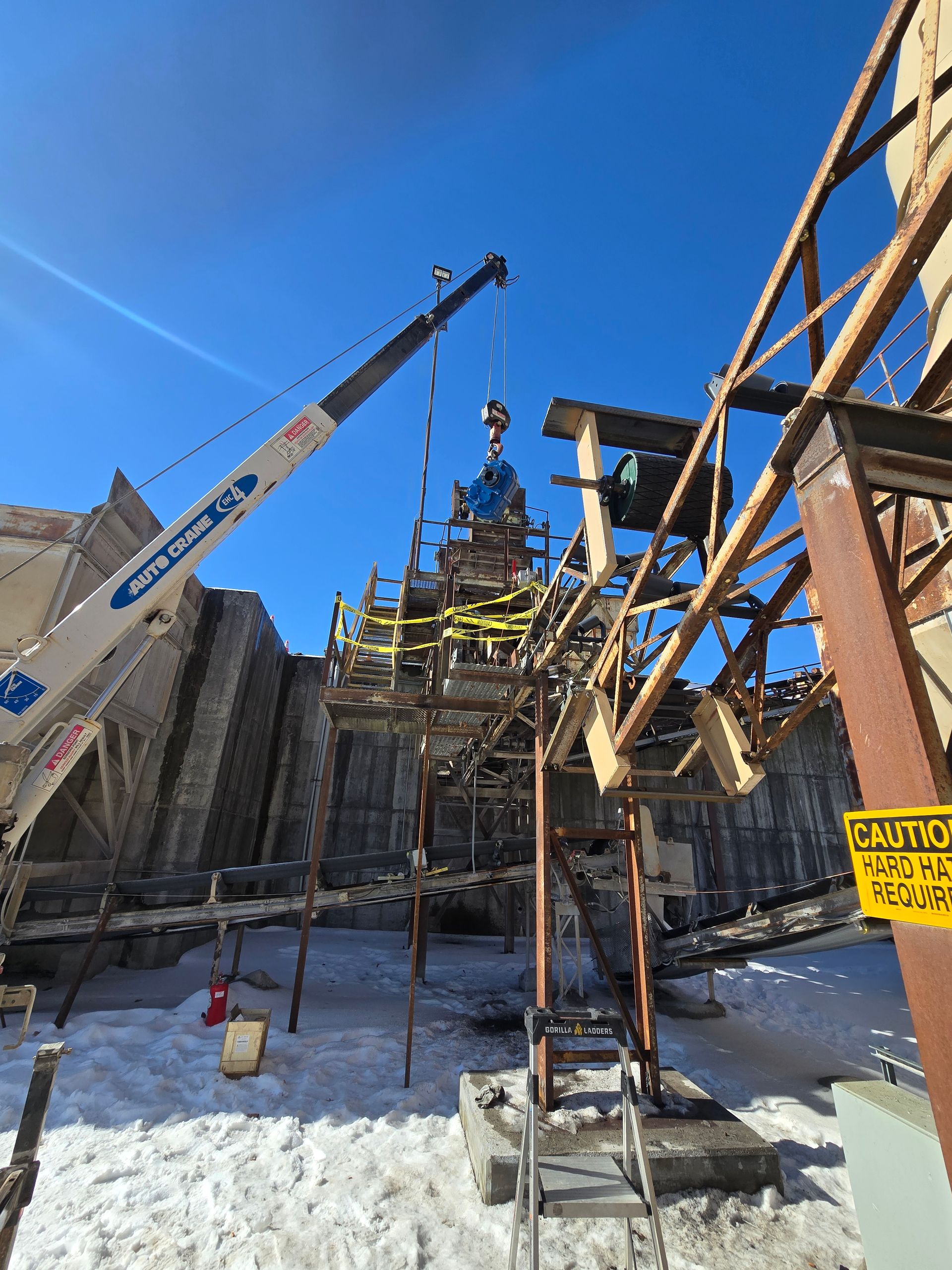 Construction site with crane lifting materials