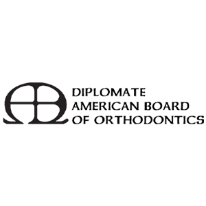 Black logo and text reading “Diplomate American Board of Orthodontics”