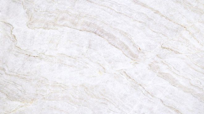 Light white marble surface with faint beige veining