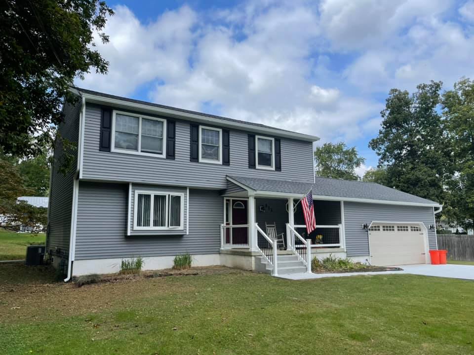 Gray siding with white porch
