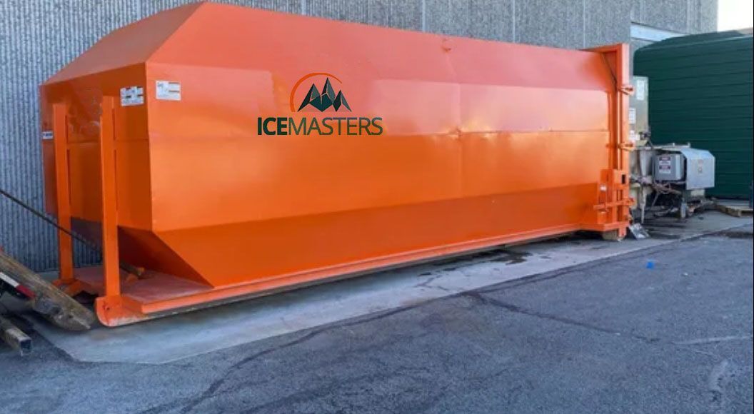 orange-painted compactor