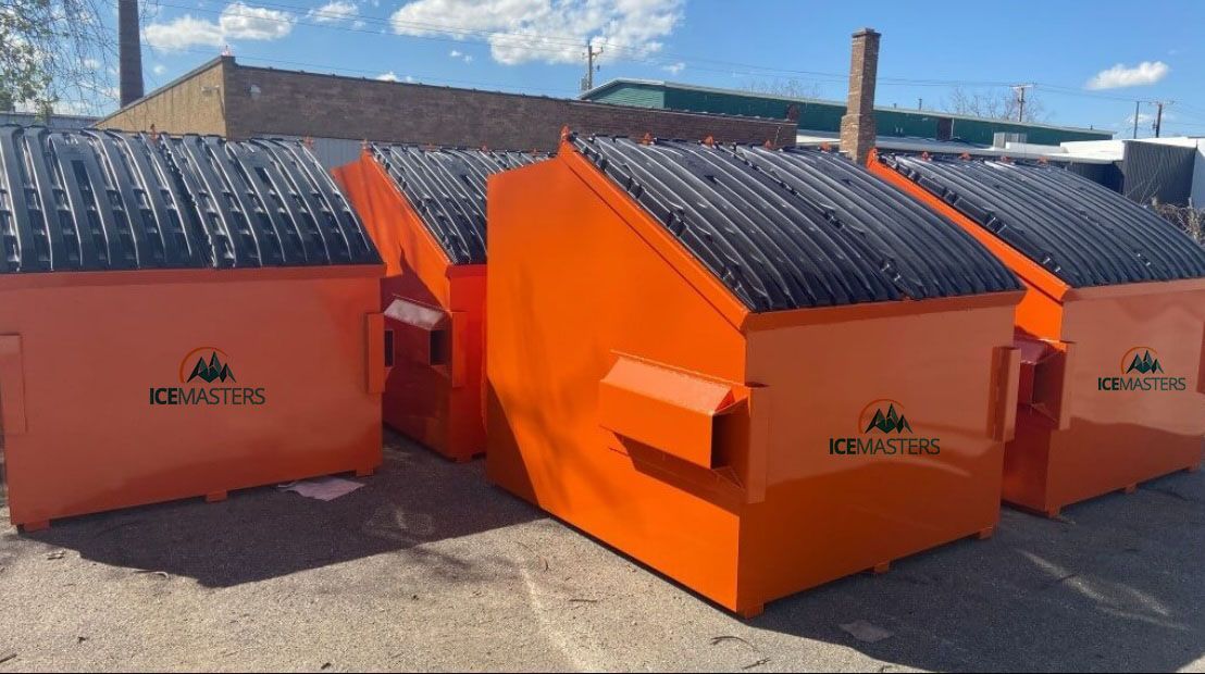 several front-load dumpsters