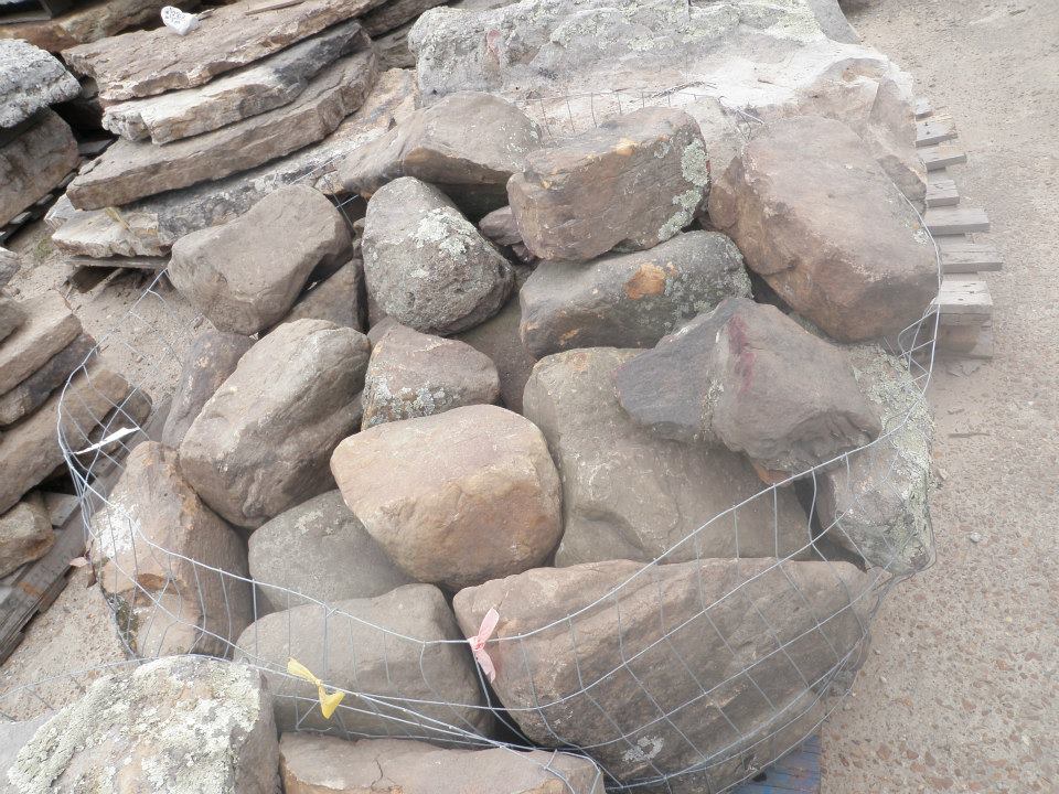 One man size Arkansas Boulders
