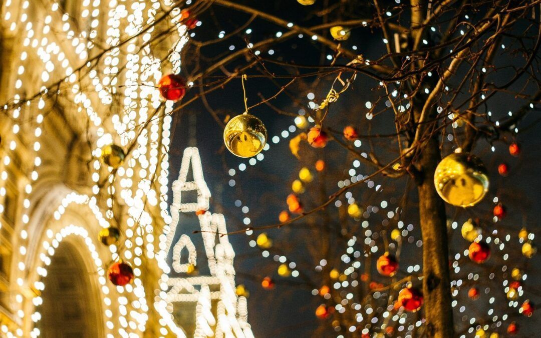 Festive city lights and illuminated decorations glowing at night on a street or plaza