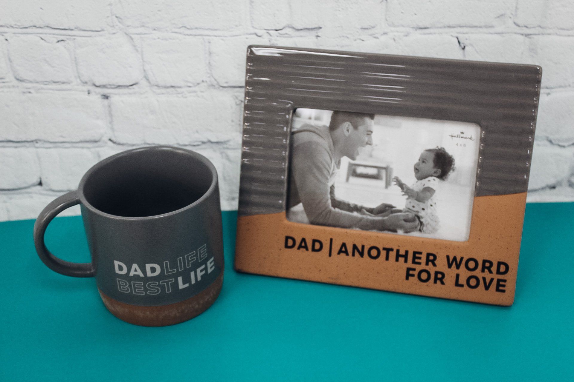 father & child image on a picture frame