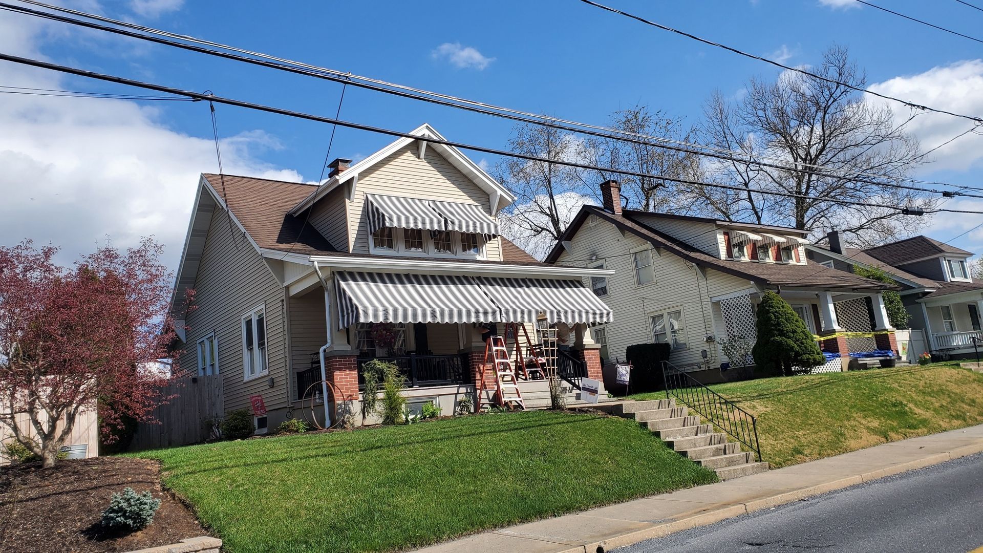 blue and white stripes residential awning