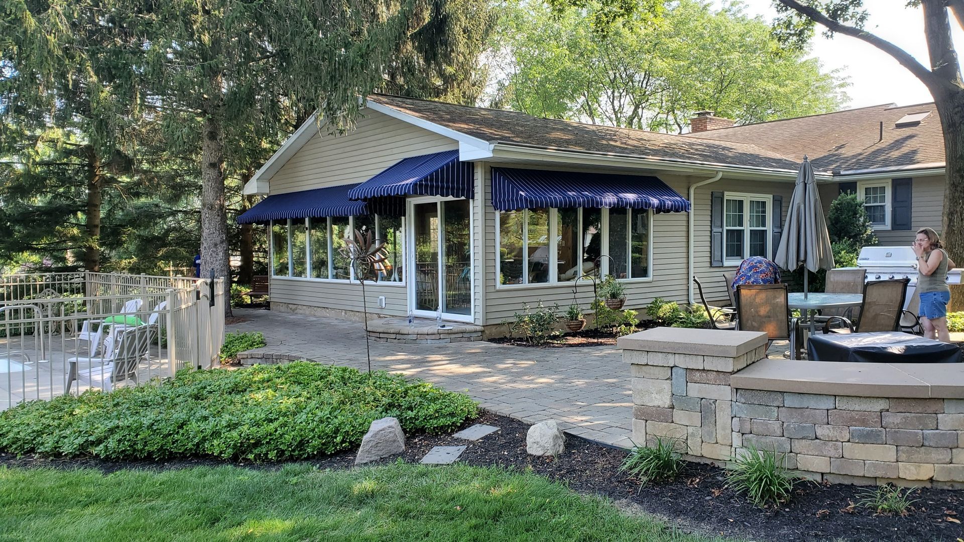 bright blue and white residential awnings