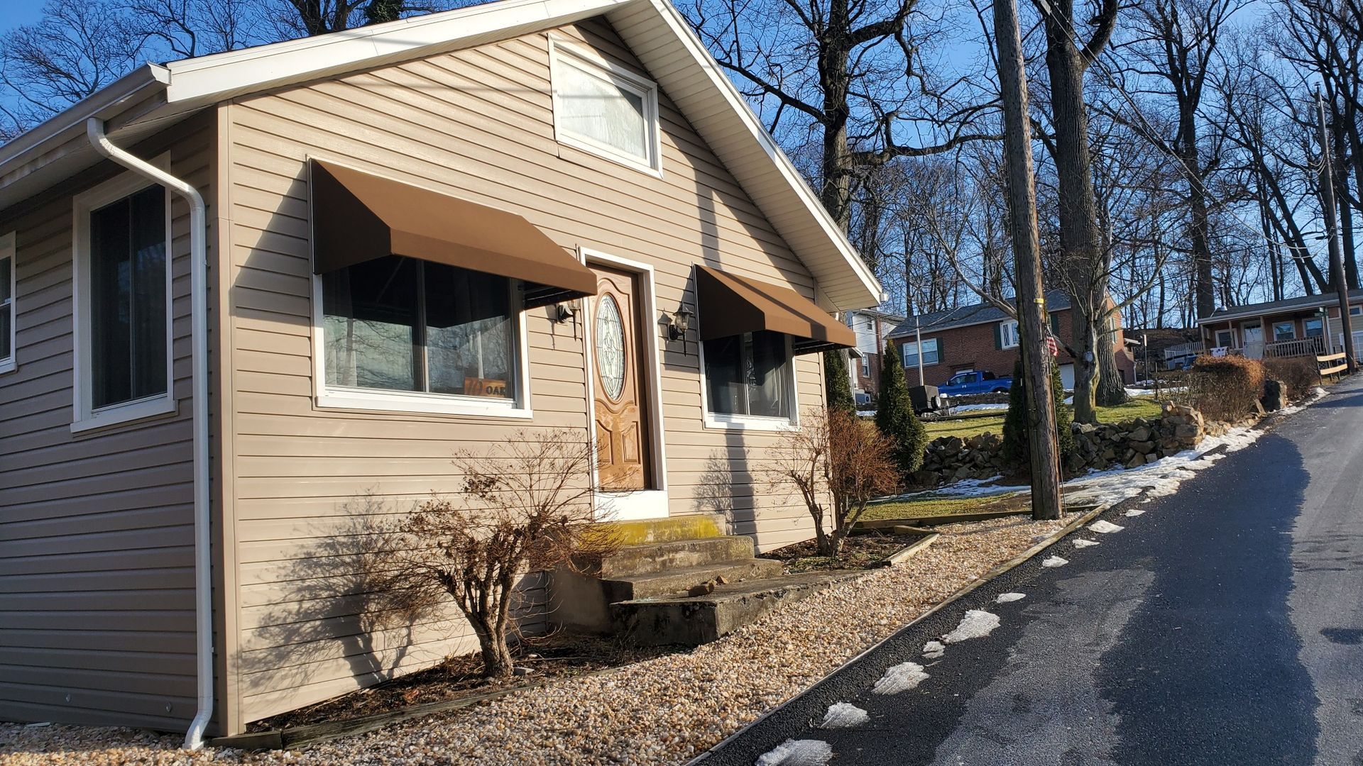 brown residential window awnings
