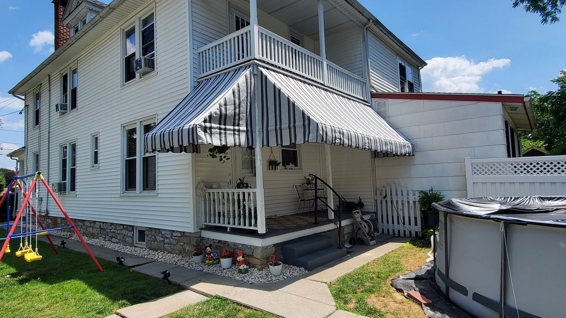 gray and black residential awnings