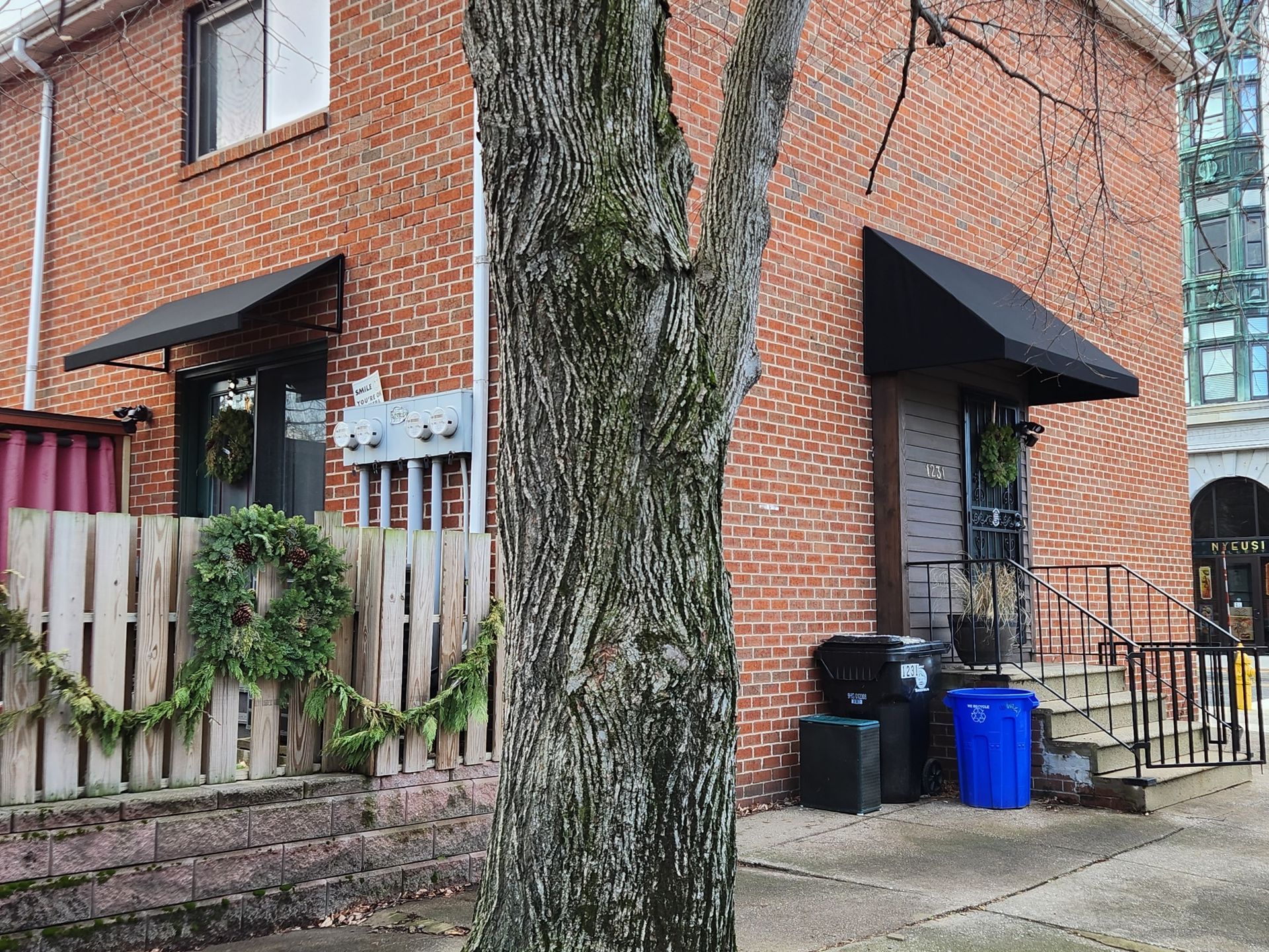 black residential door awning