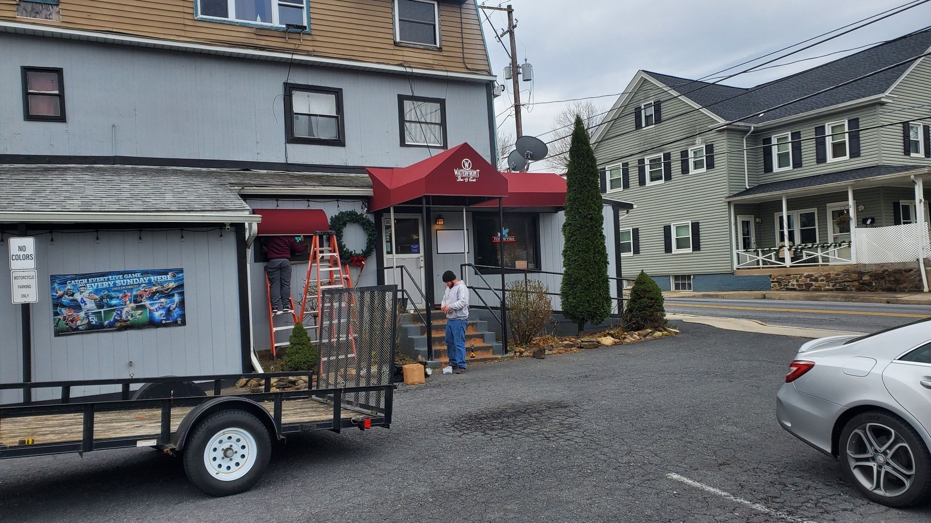 waterfront bar and grill red awning