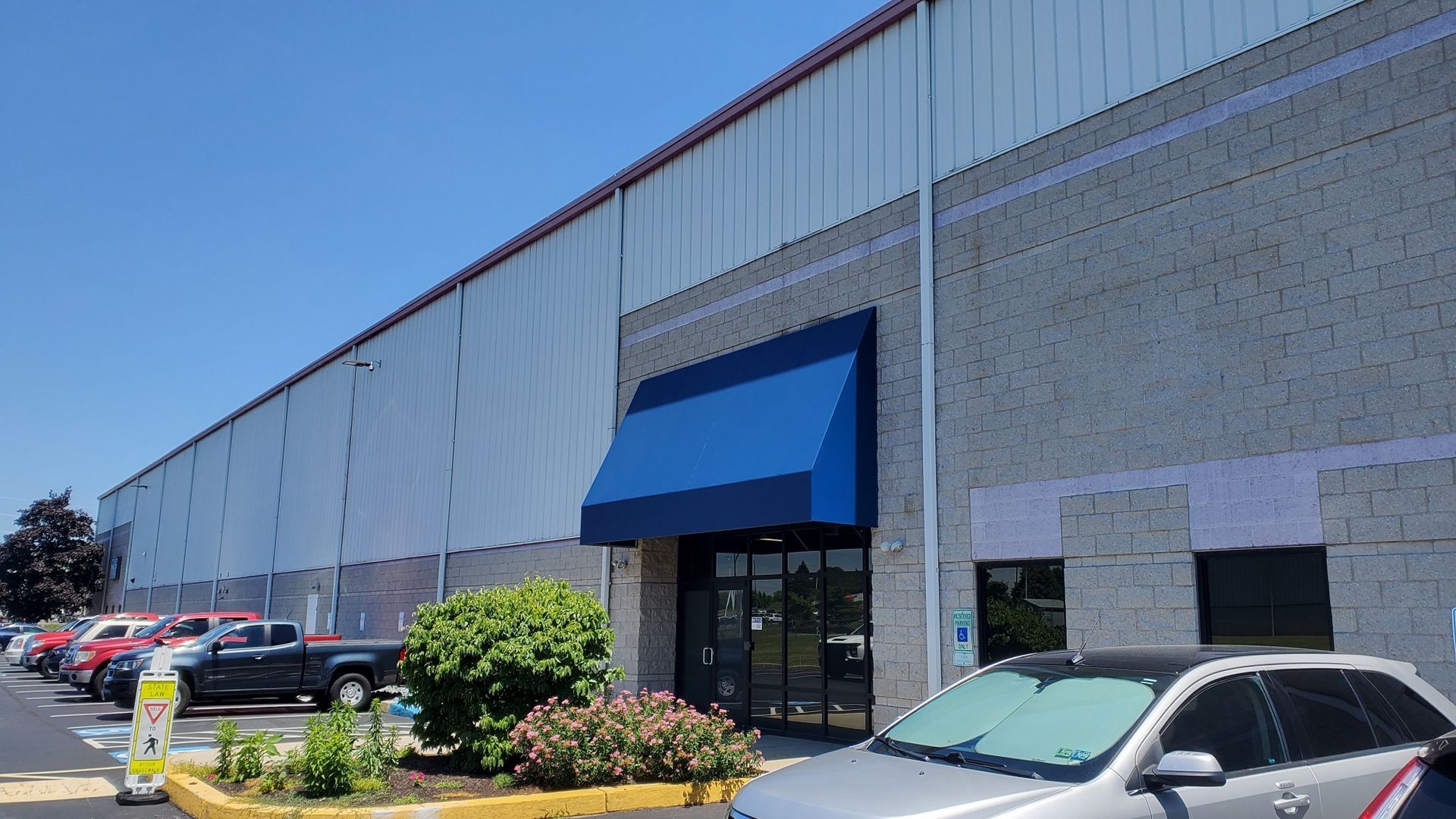 blue commercial door awning