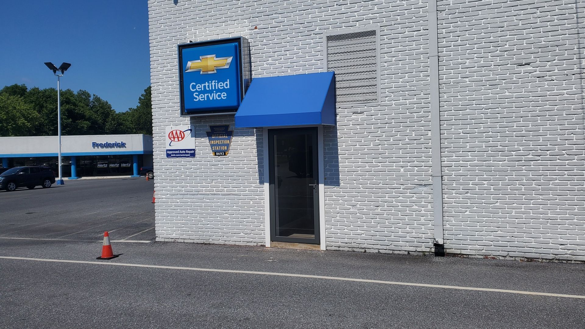 blue commercial small door awning