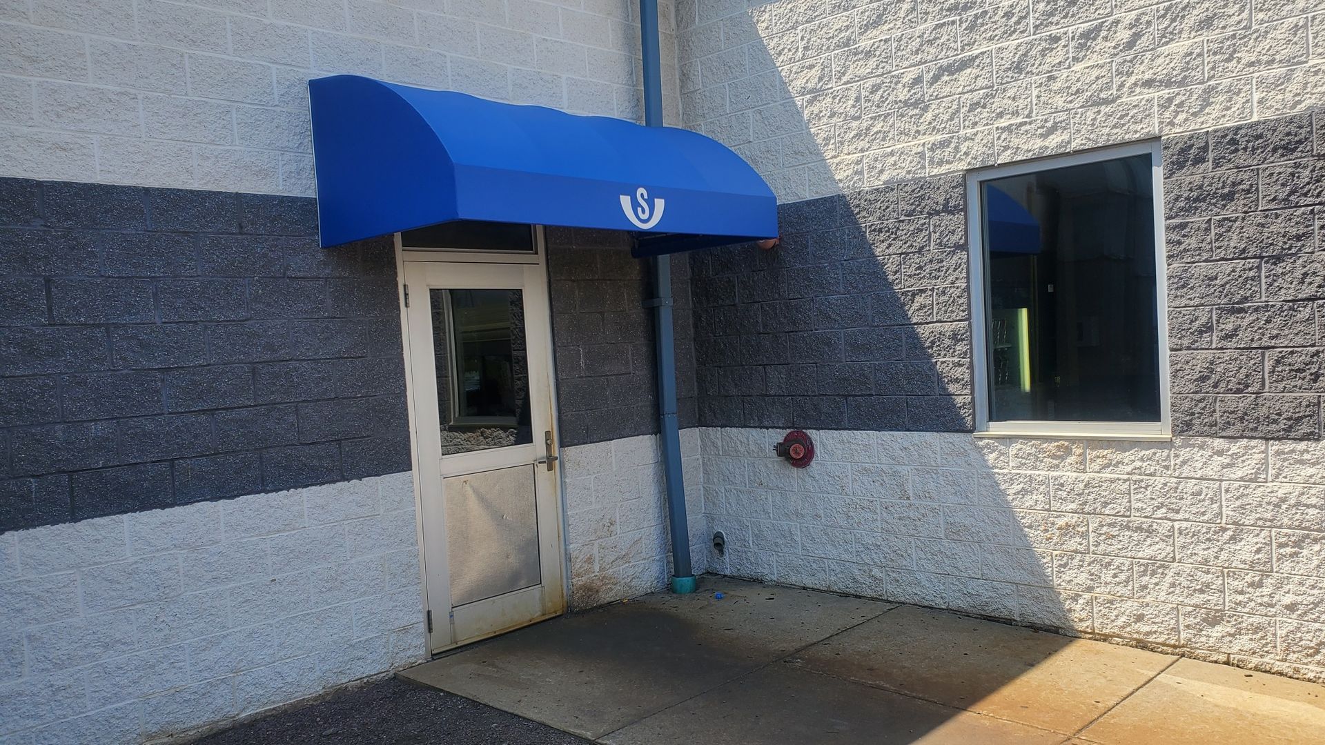 bright blue commercial awning