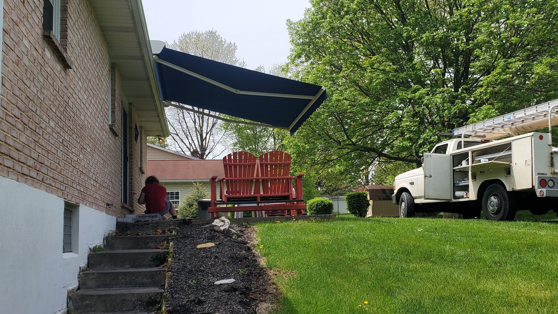 black residential retractable awning