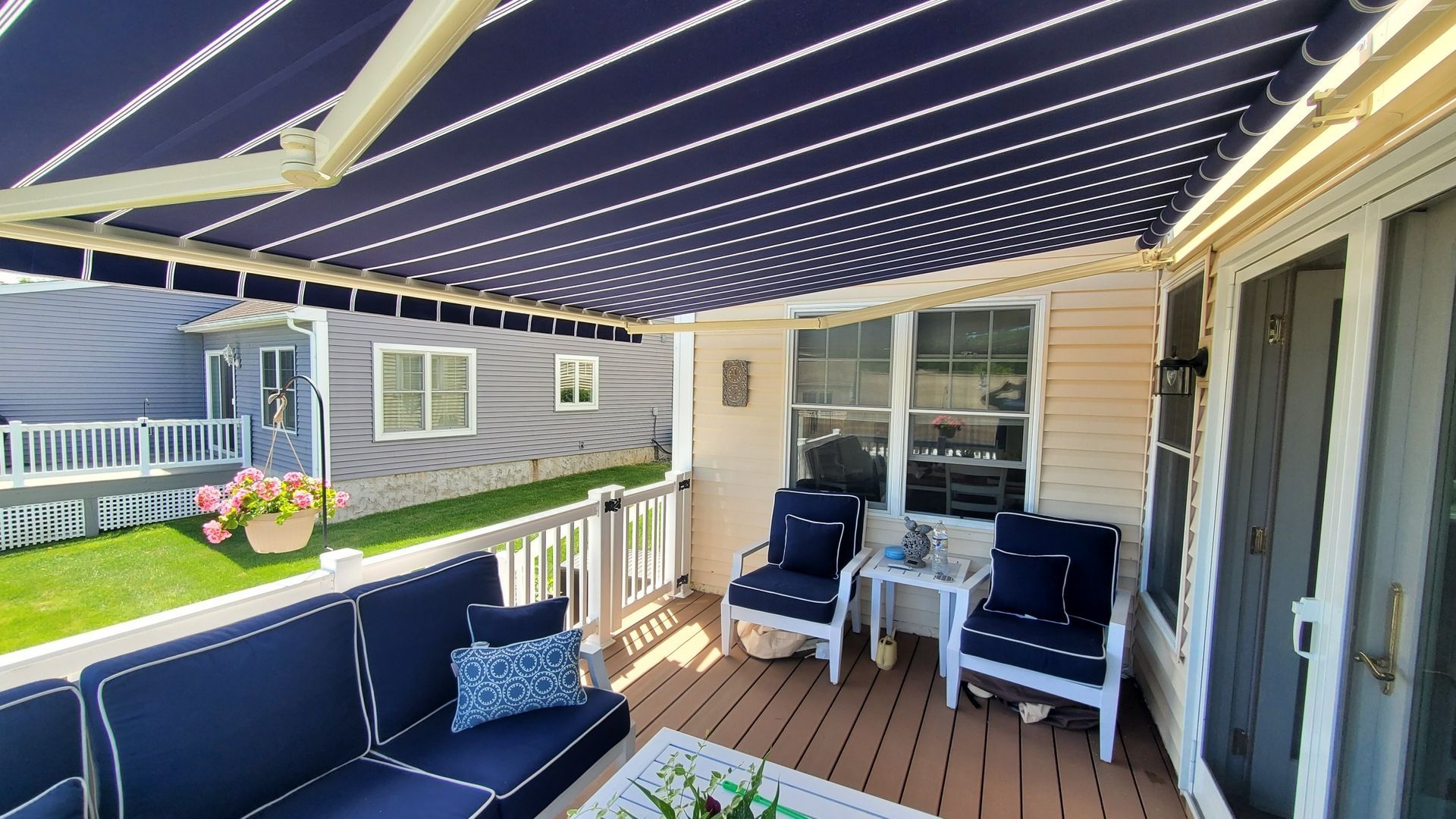 blue and white retractable awning