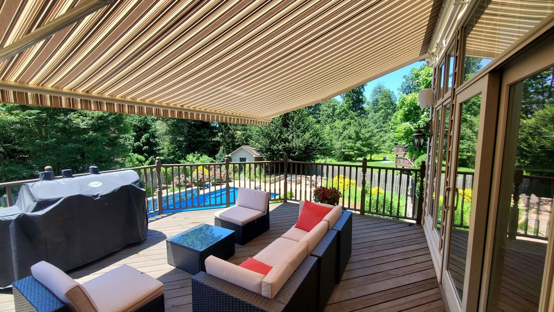 brown and beige retractable awning