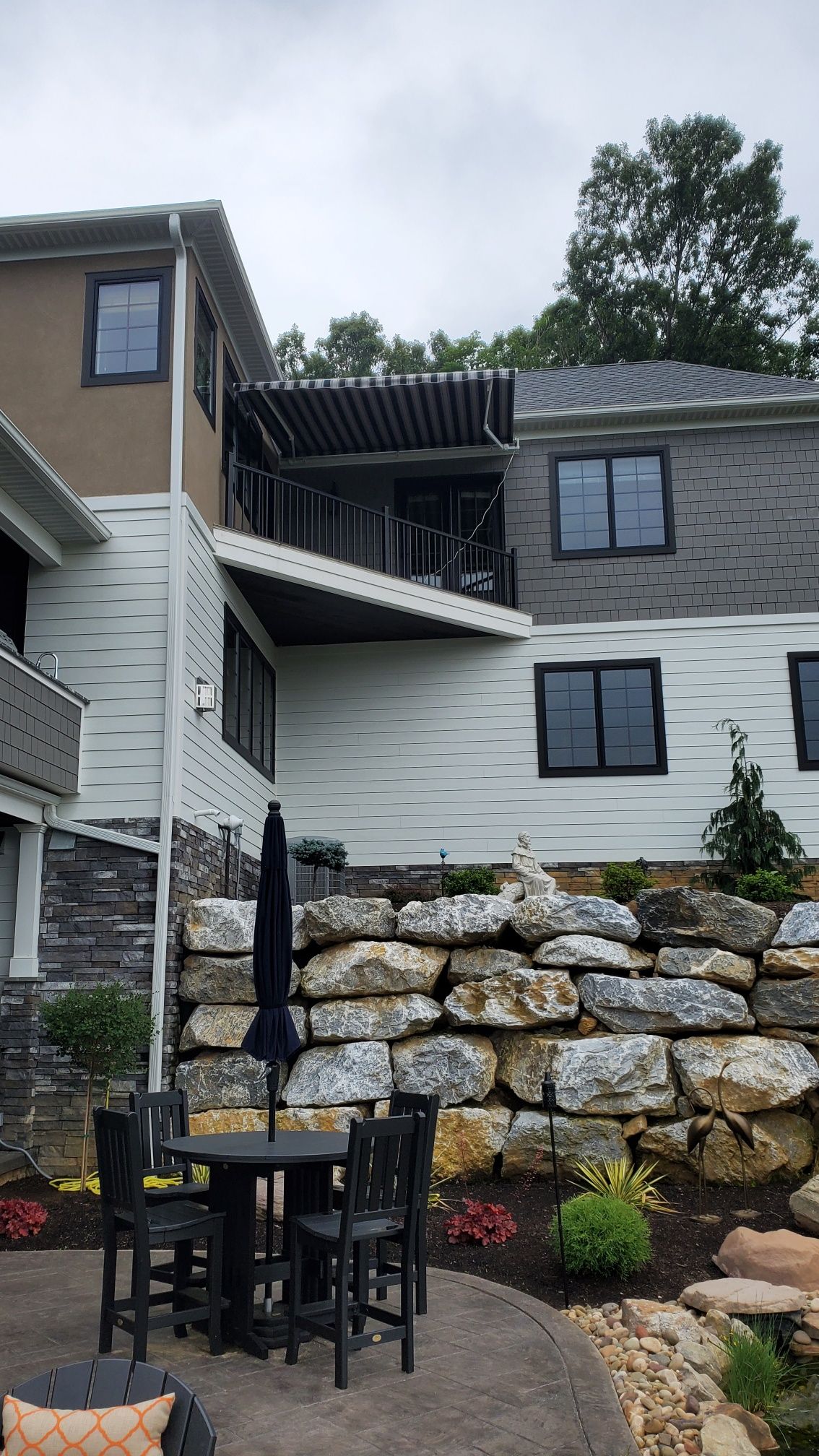 retractable awning at the top floor