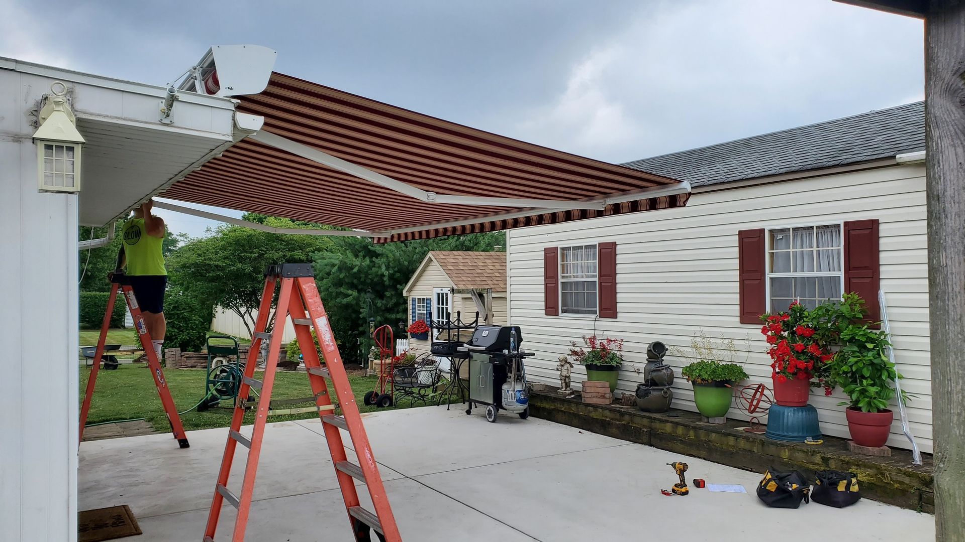 red and black retractable awnings