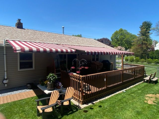 red and white stripes retractable awnings