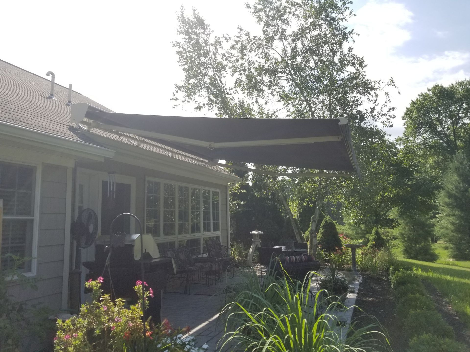 backyard black retractable awning