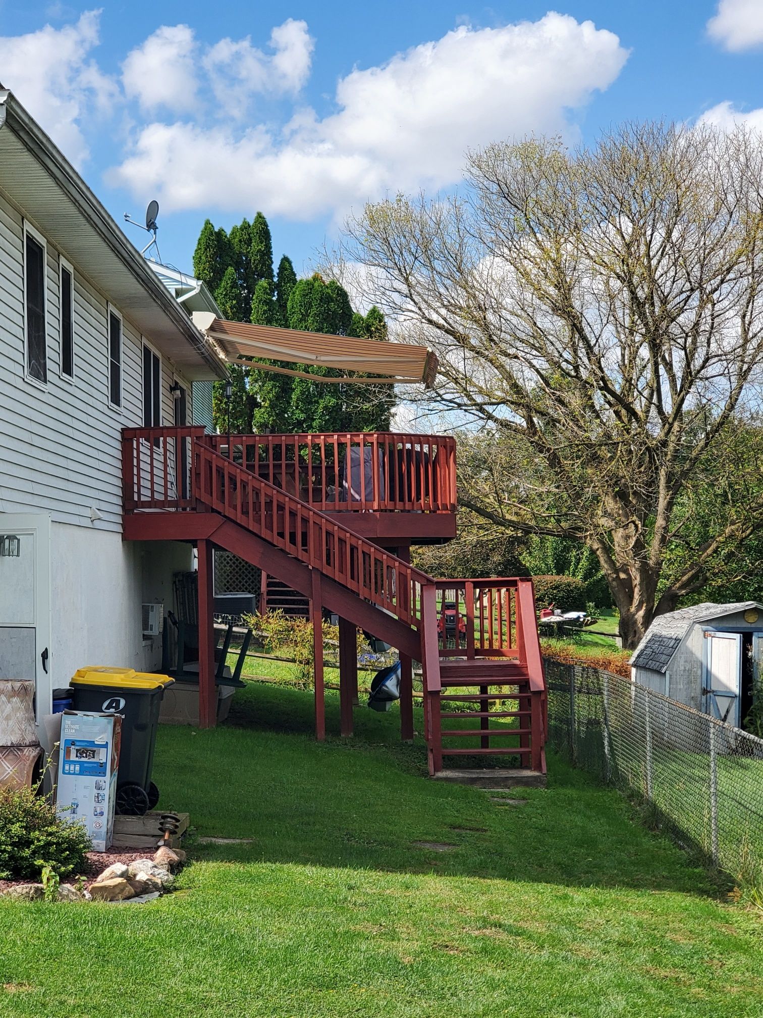 red porch retractable awning