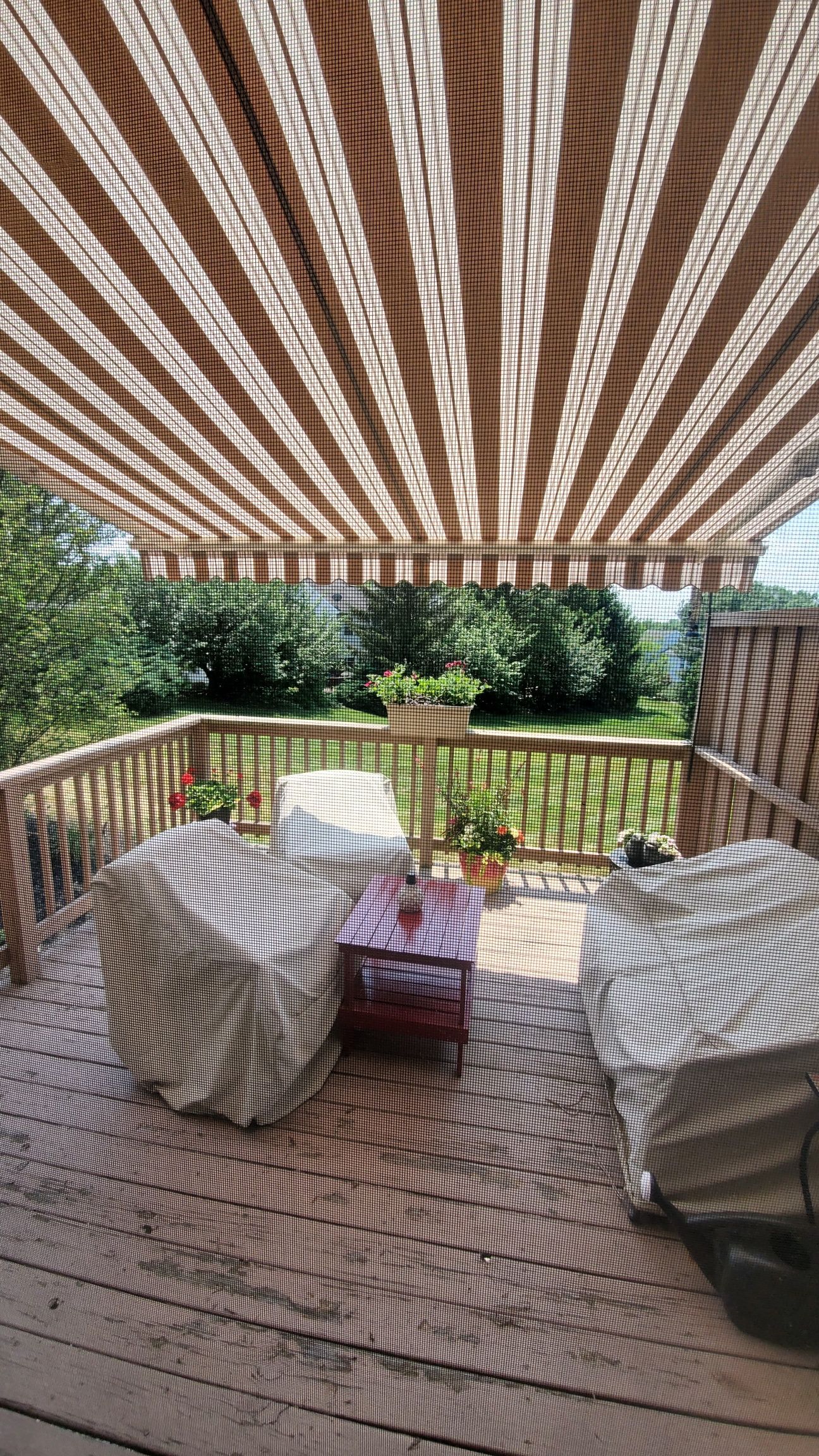 brown stripes retractable awning