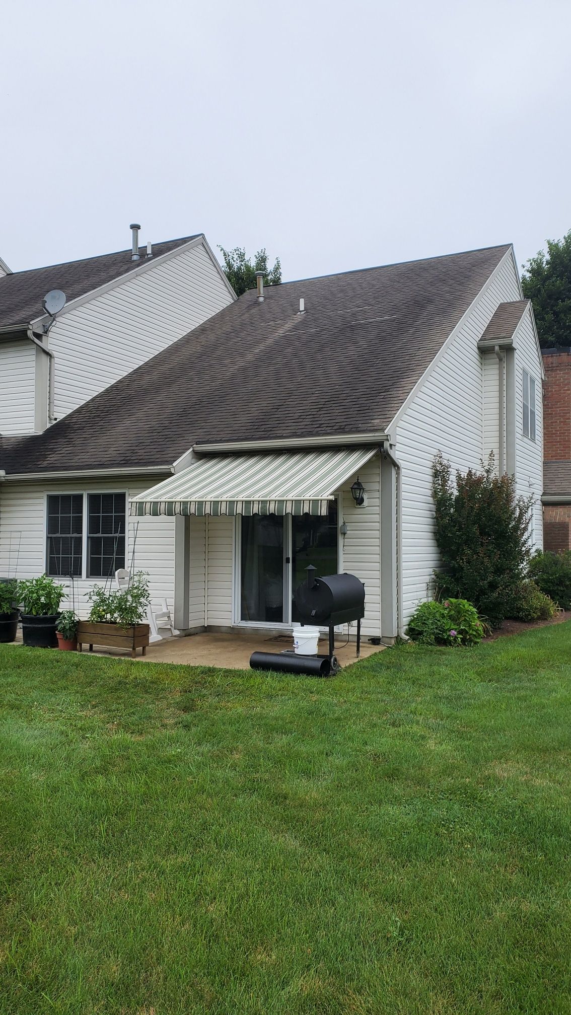 green and white stripes retractable awning