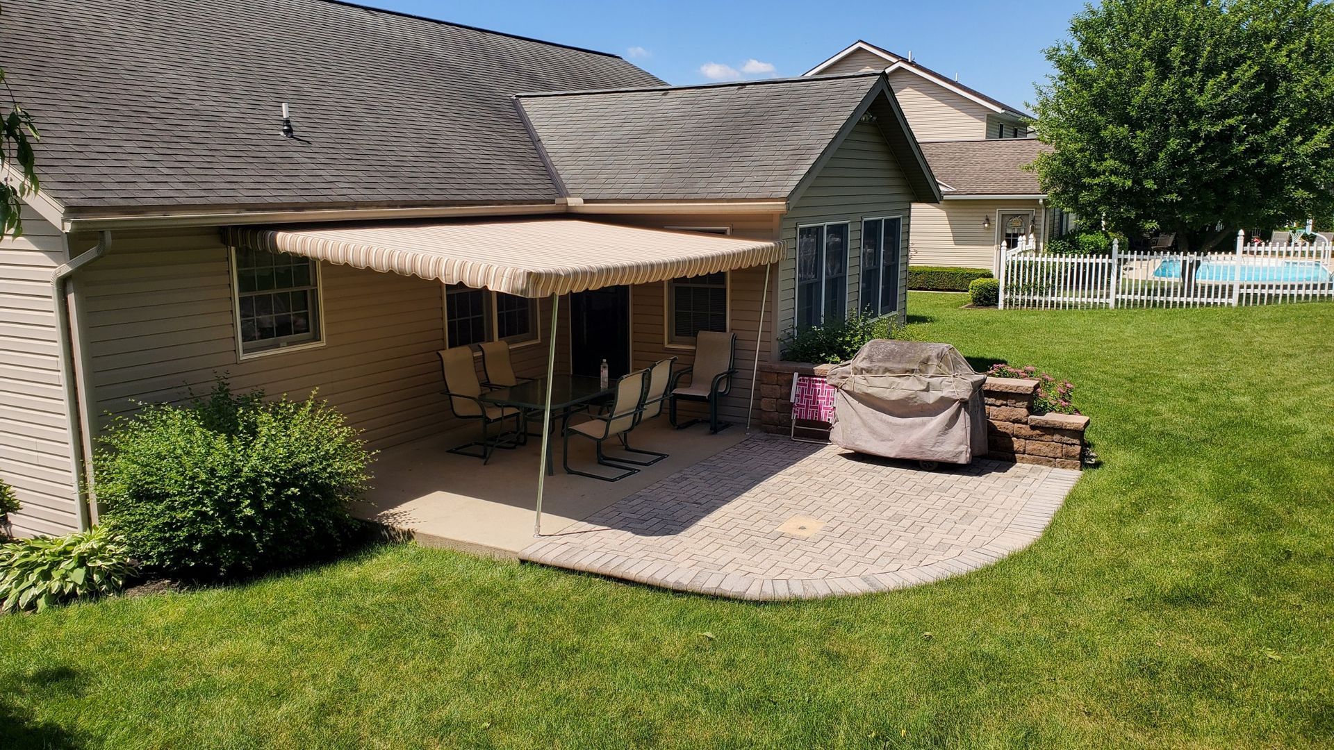 beige and brown stripes stationary patio cover