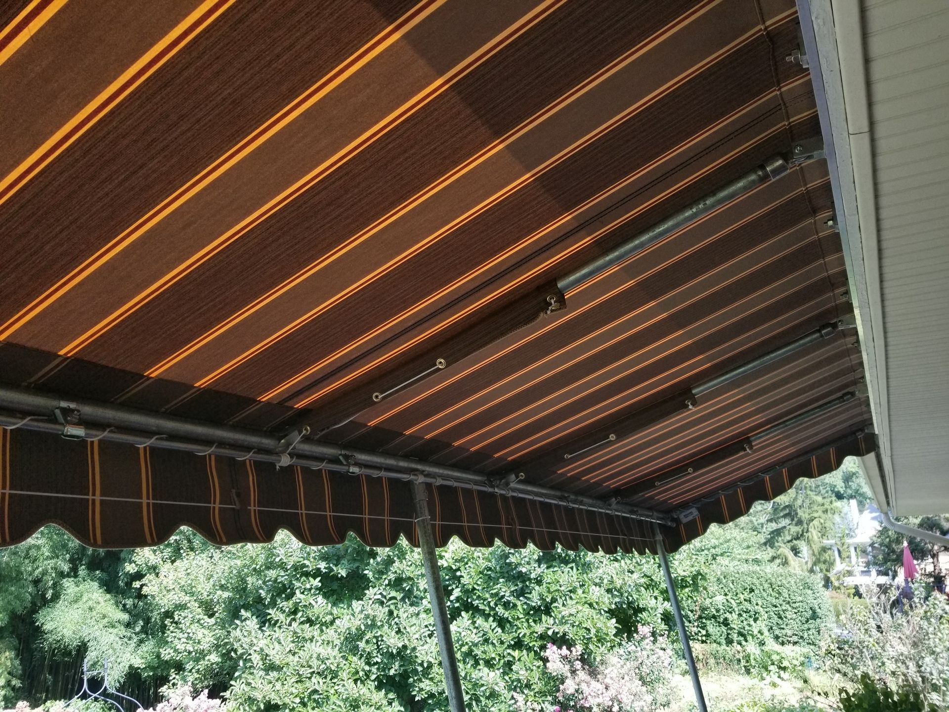 black and maroon stationary patio cover